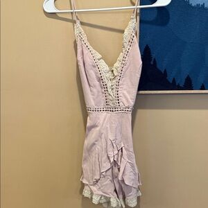Saints Secret. NWT XS  gorgeous. Sexy and playful Lace Trim Pink Romper
